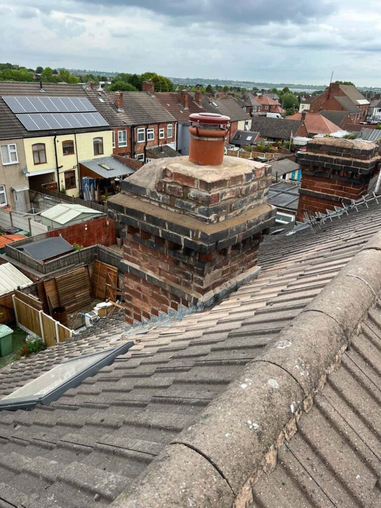 This is a photo taken from a roof which is being repaired by Matlock Roofing Repairs, it shows a street of houses, and their roofs